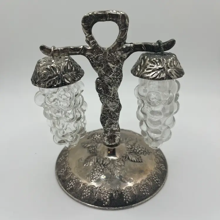 vintage set of salt and pepper shakers featuring a grape and leaf design. 1970’s