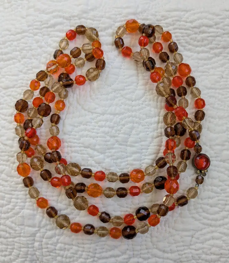 Vintage 58" Glass Bead Necklace in Shades Of Orange and Brown