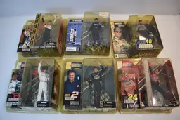 Lot of 12 MacFarlane NASCAR action figures New in package, Some wear and damage