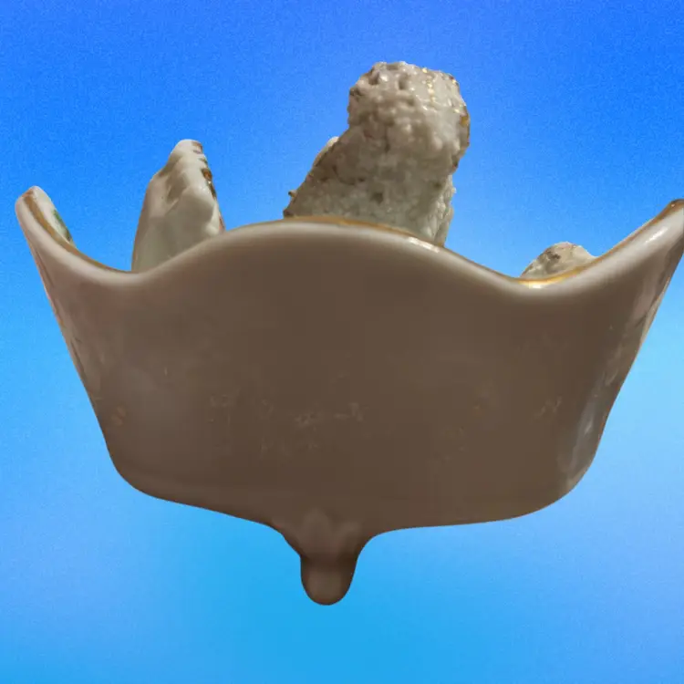 Porcelain Spaghetti Poodle Figurine On A Couch (Japanese)