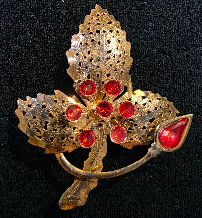 Thin Gold Tone Leaf with Red Gem Flower