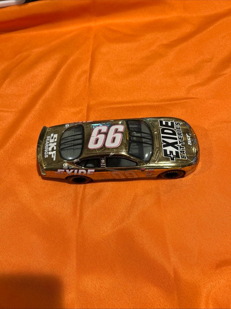 1998 Jeff Burton #99 Exide 1/24 diecast Racing Champions Gold