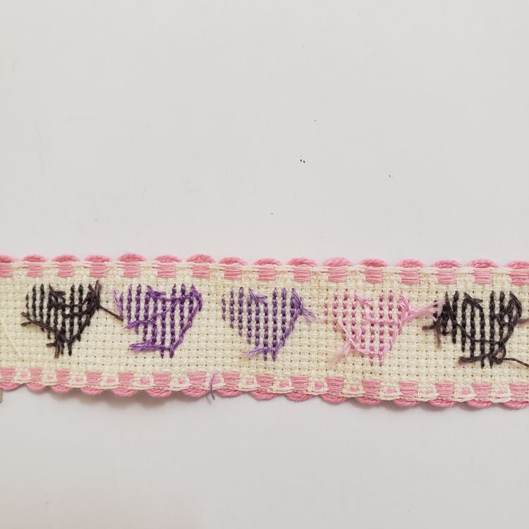New Cross-stitched heart themed Ribband ivory with pink trim.