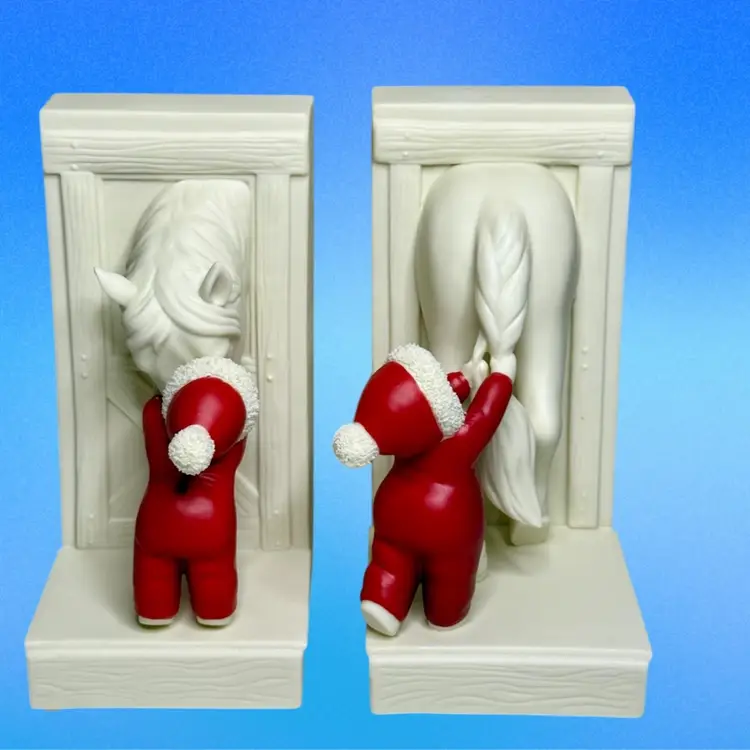 Department 56 Bookends Snowbabies Babies on The Farm “ For The Love of Ponies” Red & White
7-3/8” T x 4-1/2” L x 3-1/2” W