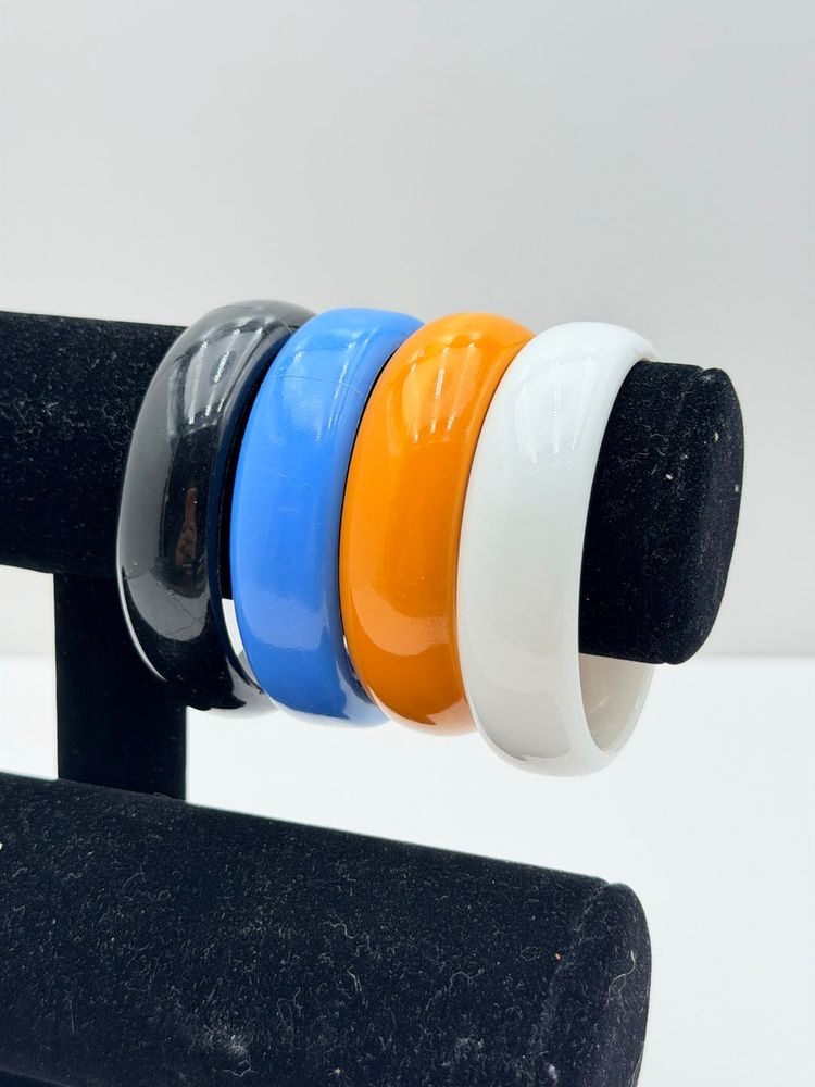 Vintage Lot Of Four Plastic Wide Bangles