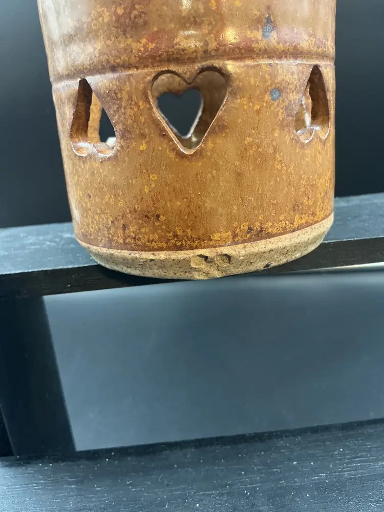 Studio pottery heart cut out, brown glaze with makers mark