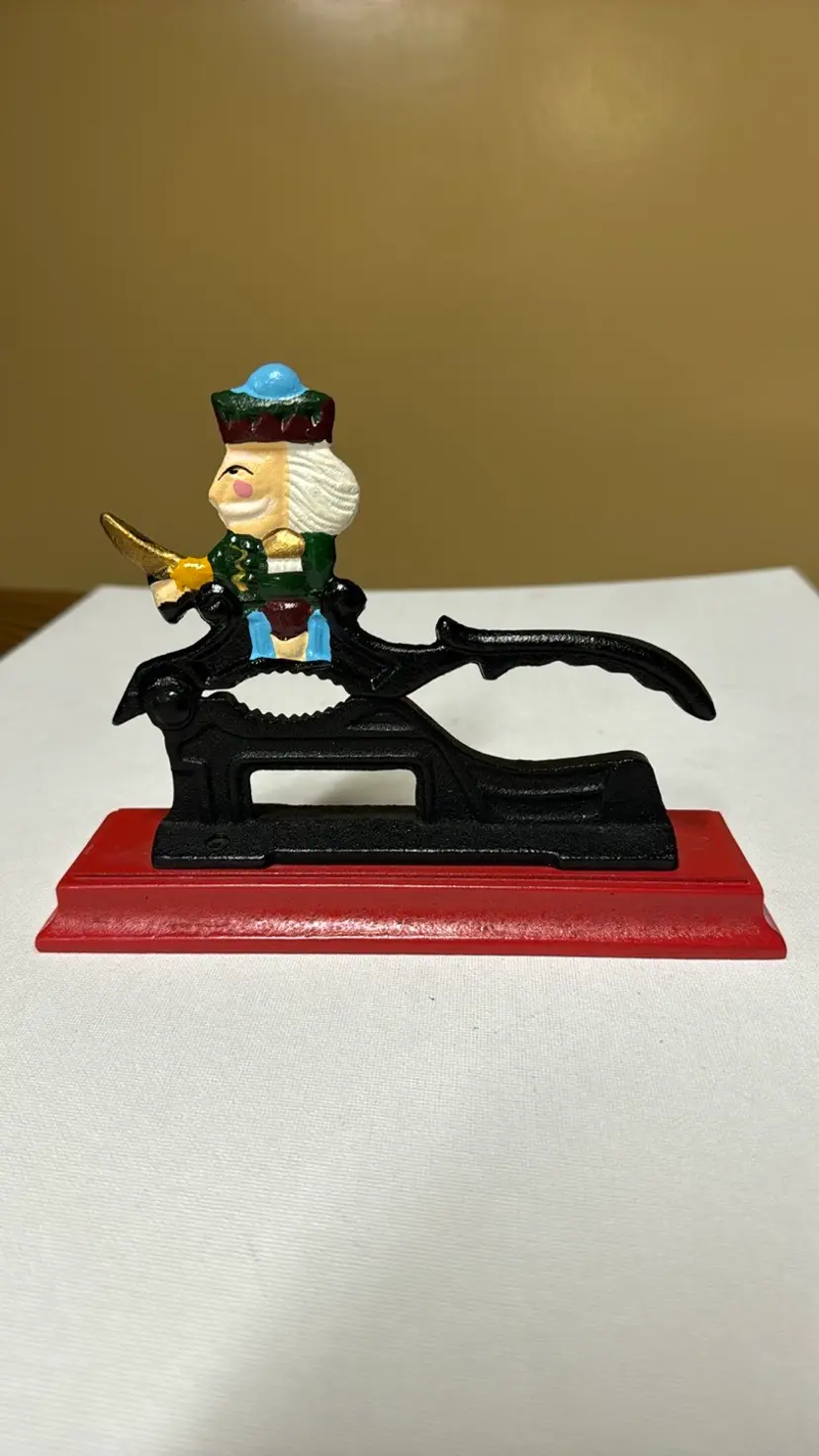 Vintage Metal Cast Iron Soldier Nutcracker Old Fashioned with Red Wood Base