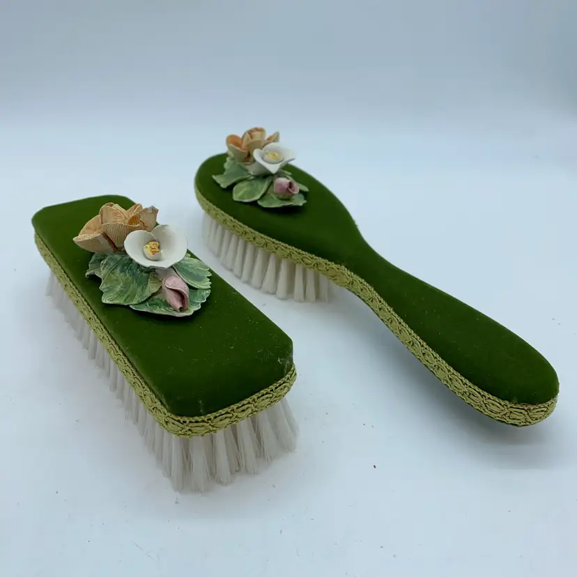 #4224 Victorian velvet vanity and clothes brushes with porcelain floral accents.