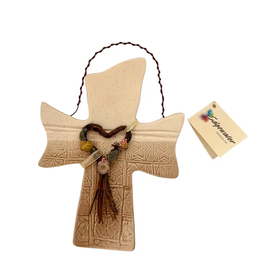 Ceramic Cross by Edgewater Designs Inc Signed By Artist Carol Jones Tan Beige Heart Shaped Floral Home Decor 2002 
7-3/4”  L x 6” W x 1/4” Thick 8-1/4” W/Hanger