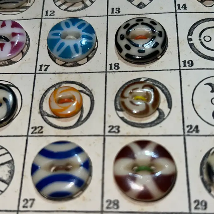 Collection of antique button stencils and designs by Lester Larsh. Button Collecting