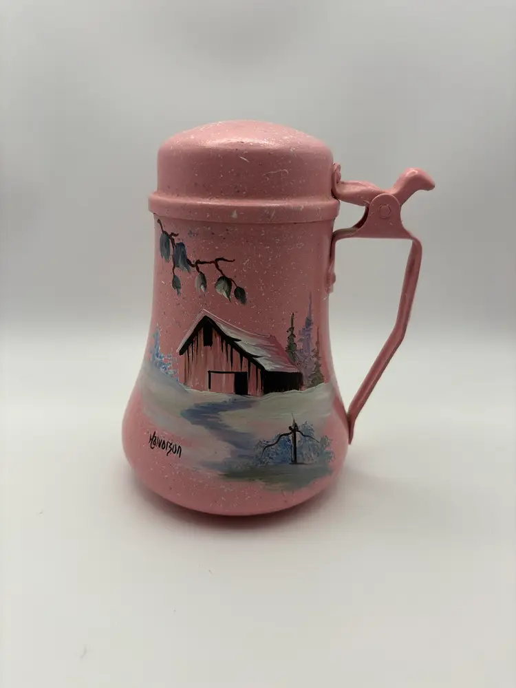 Hand painted metal pitcher