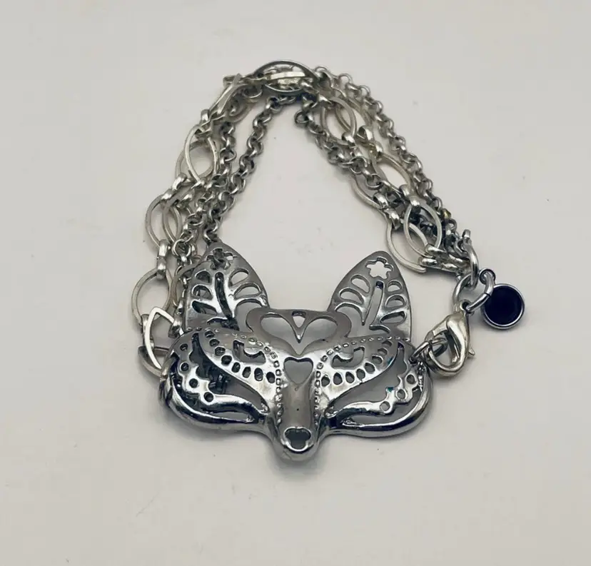 FOX, Silver-toned, Link Bracelet with Lobster-Claw Clasp, Faux Black Charm, Approximately 7.75” in length.