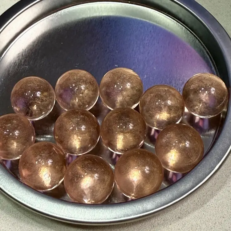 Dozen Peach Luster Marbles