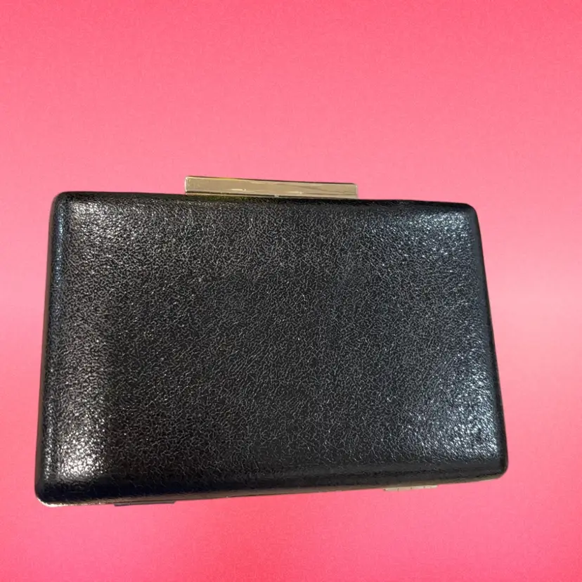 🖤 Black Expressions NYC Clutch 🖤
Structured box style with gold frame.
