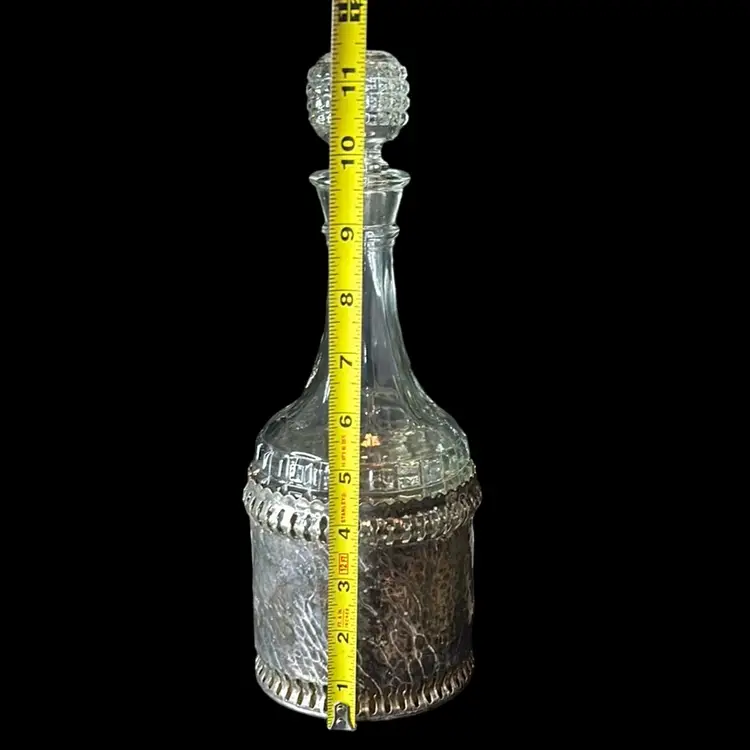 Vintage Pressed Glass Quilted Decanter And Stopper In Hammered Metal Sleeve With A Bakelite Bottom - Made In England