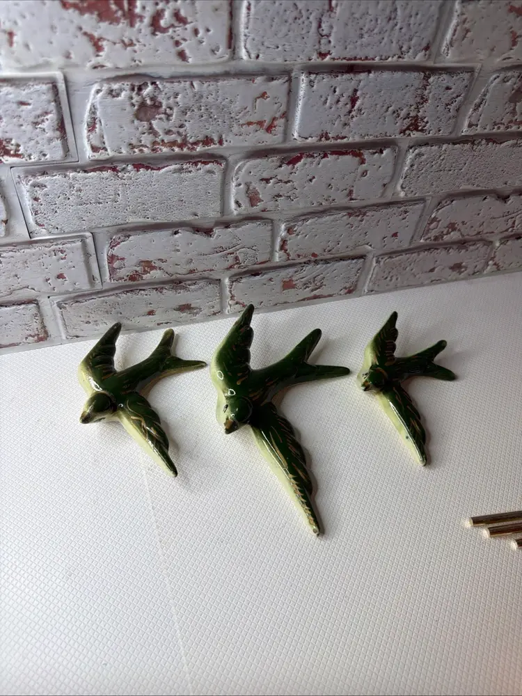 glazed hunter green ceramic swallows, a traditional Portuguese wall decor READ