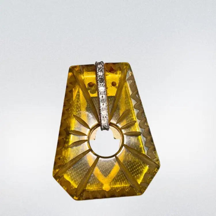 Intricate Carved Apple Juice Dress Clip 
Missing Rhinestones