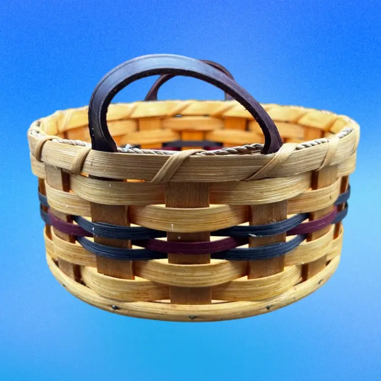 #279B Vintage Handcrafted/Handmade Woven Medium Round Gather Basket Red And Green Bands With Two Leather Handles And Solid Bottom.  
Signed On Bottom Eli Shetler Family 10-4-06 Wisconsin
