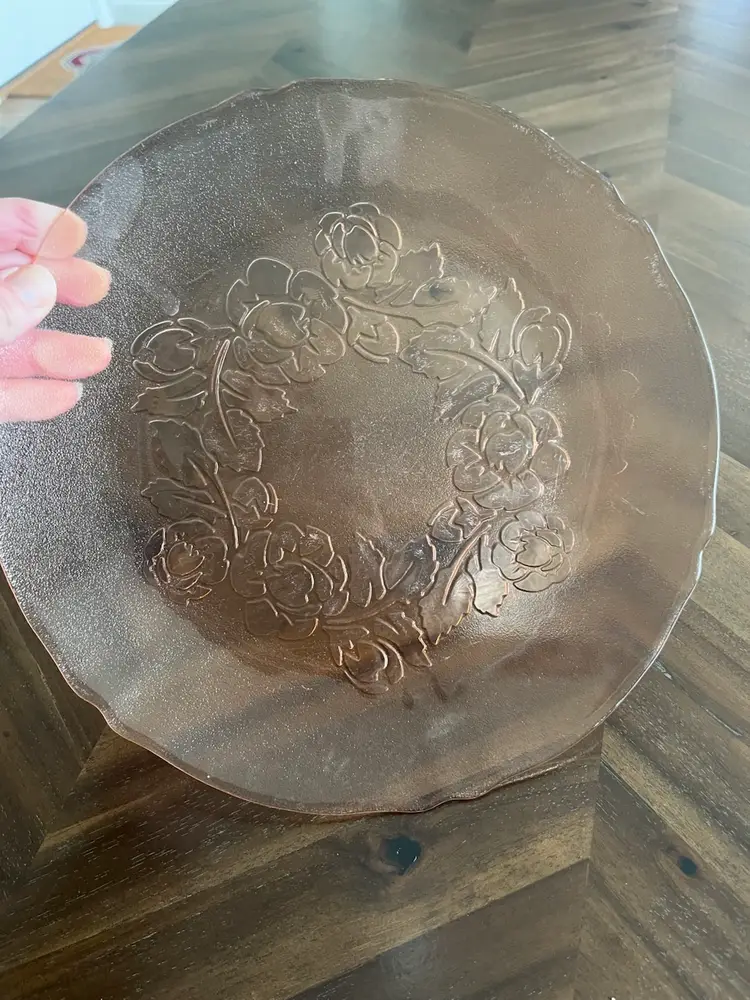 pink vintage Arcoroc Rosa glass plate with a raised floral design.  10”