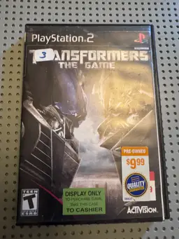 #01 Transformers: The Game – PlayStation 2 – Pre-Owned, Tested & Working