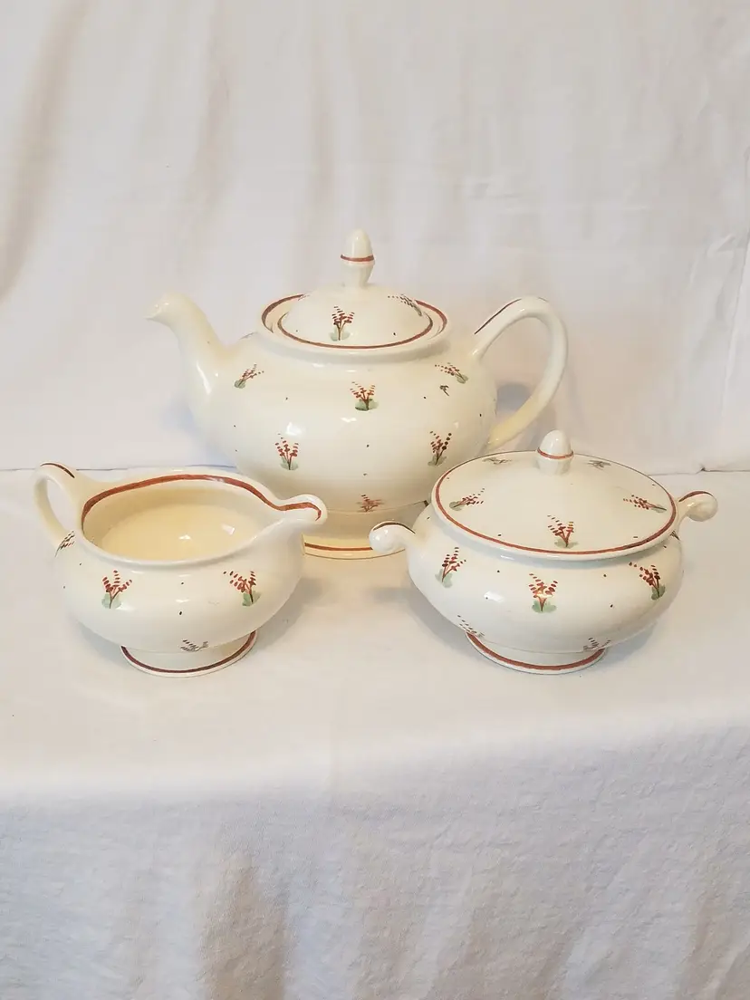 Vintage Homer Laughlin Eggshell Nautilus Teapot, Sugar Bowl with lid and Creamer.
