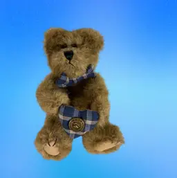 Vintage Boyd’s Bear With Blue Plaid Bow Tie Holding Blue Plaid Heart