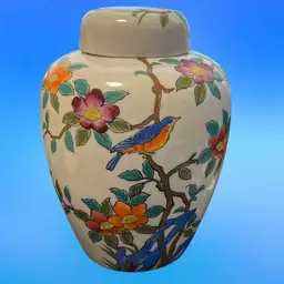 Vintage hand-painted Japanese porcelain ginger jar with floral and bird motif. 7” Tall With Lid. Has A Bird On It 😊 Not Marked On Bottom.