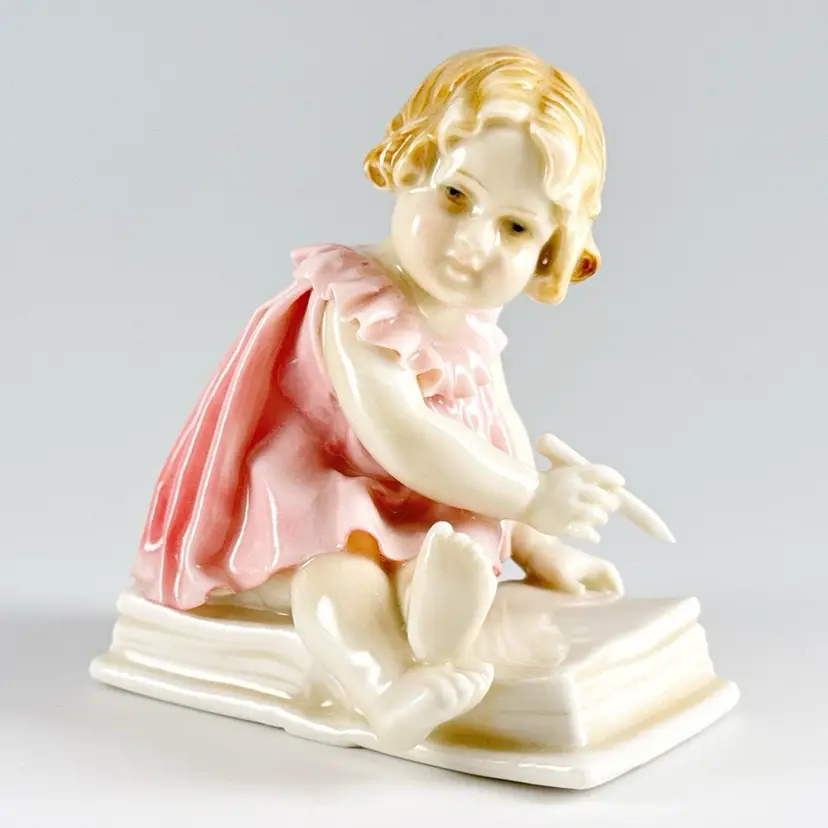 Karl Ens Dresden Hand-Painted Porcelain Figurine, Girl in Pink Dress On Book Holding Pencil, Vintage Made in Volkstedt Germany - FREE USA SHIPPING