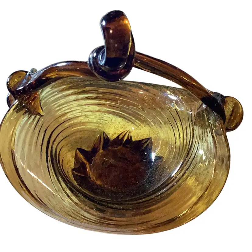 Viking blown glass basket in an amber color