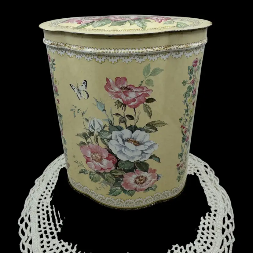 Vintage Raphael Tuck & Sons floral tin with hinged lid.