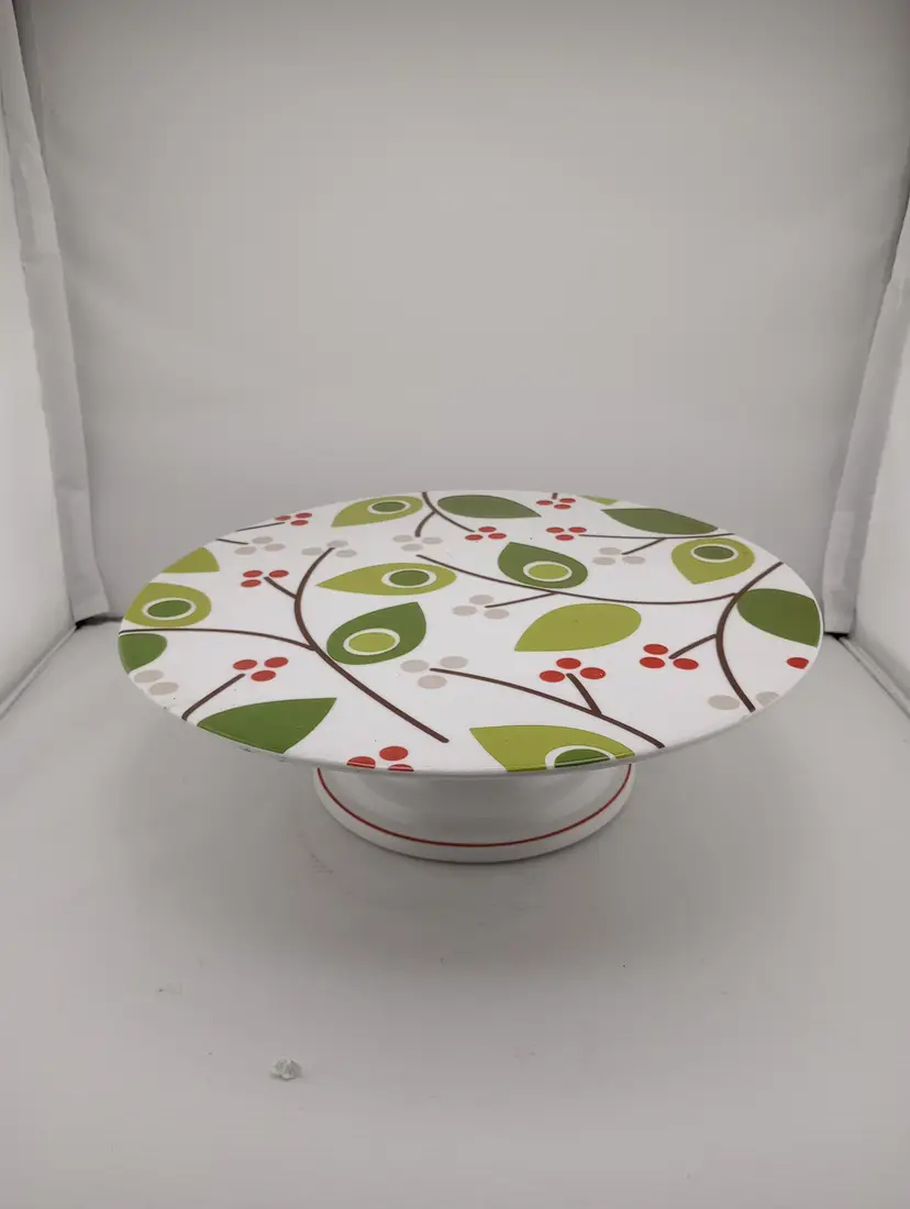 Ceramic cake stand with stylized holly pattern