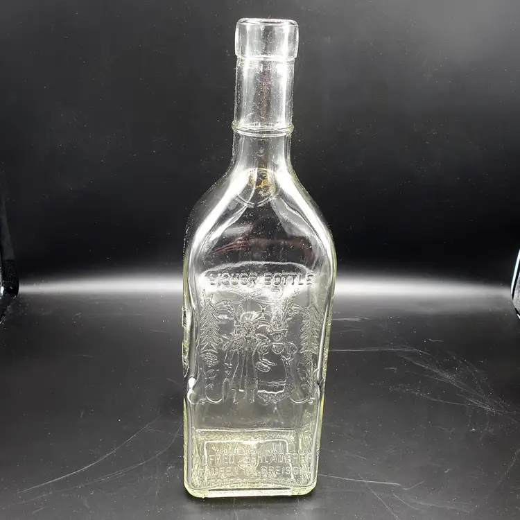Vintage Clear Glass Schladerer Liquor Bottle with Embossed Design, West Germany