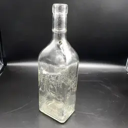 Vintage Clear Glass Schladerer Liquor Bottle with Embossed Design, West Germany