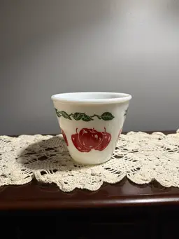 Hazel Atlas milk glass mixing bowl with an apple and leaf design