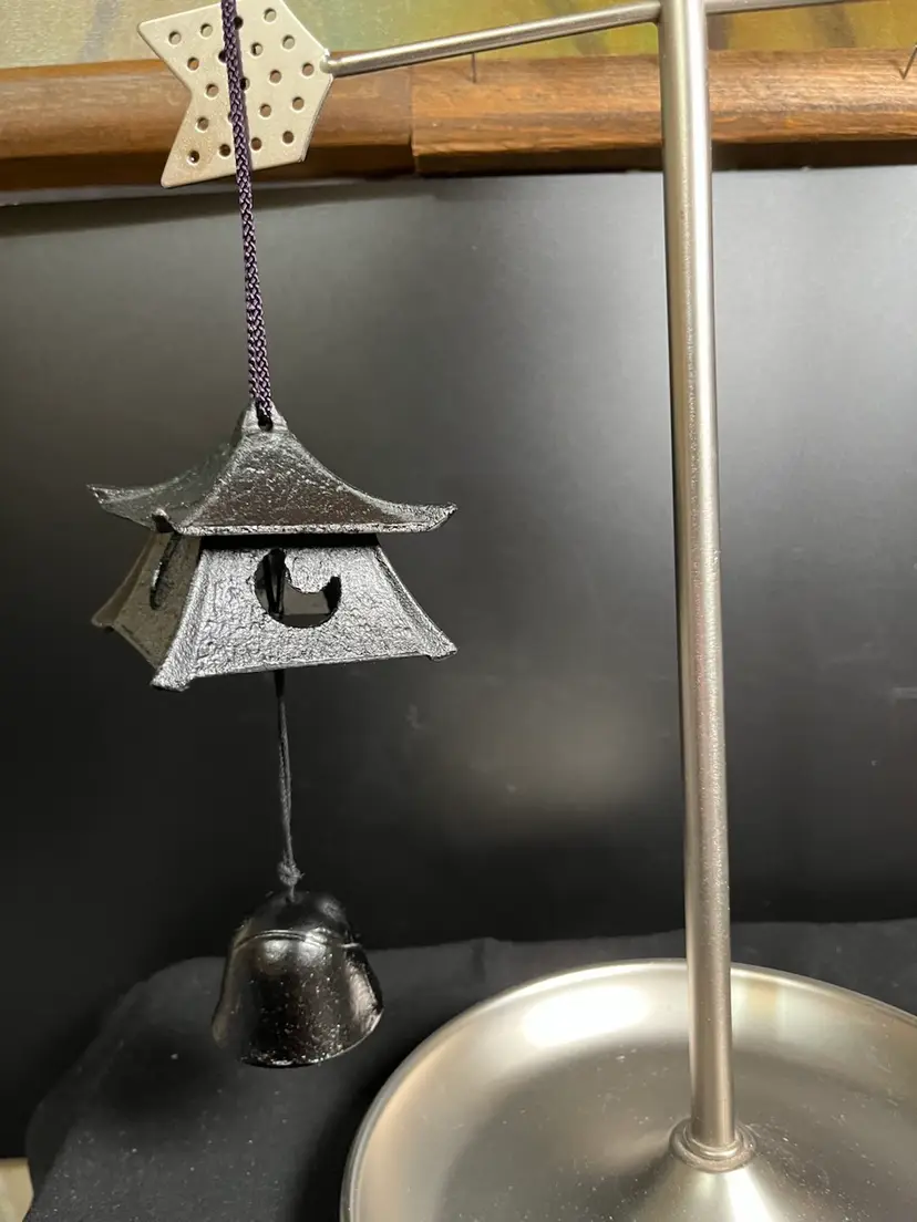 Vintage Japanese Cast Iron Nabu Wind Chime. This Actually Has 2 Pieces. The Pagoda is on Top-Featuring Cut Out 1/2 Moons & Full Moons. The Bottom Piece is Bell Shaped w/ a Young Lady Imprinted on it.