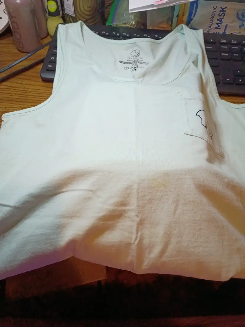Comfy Elephant Tank Top size small although this is a brand new shirt there is a call out on the back of the shirt there's a black mark I did take a picture of it Price will be reduced