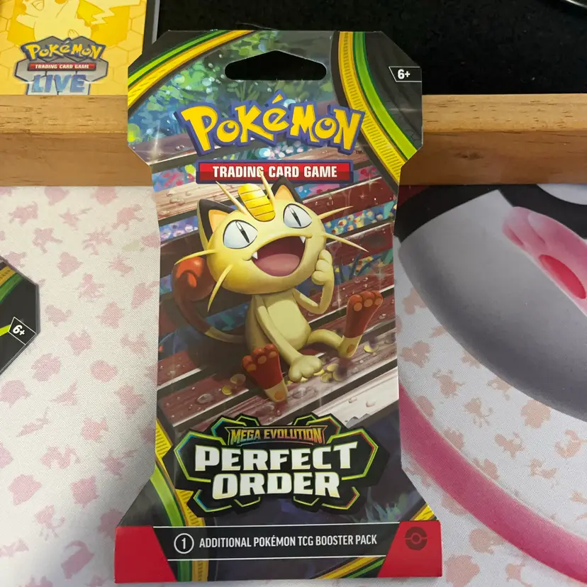 Pokémon Trading Card Game: Mega Evolution - Perfect Order Sleeved Booster Pack.