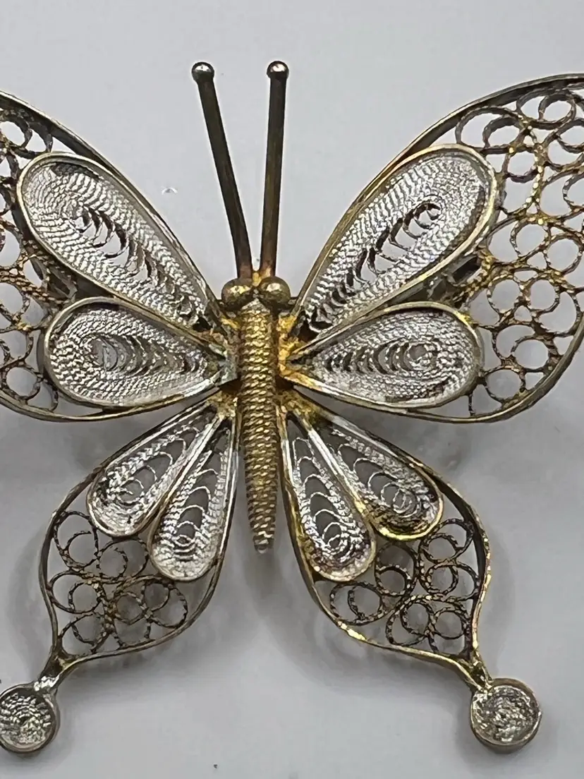 Vintage filigree butterfly brooch, Marked sterling With Gold Fill accents.  1”