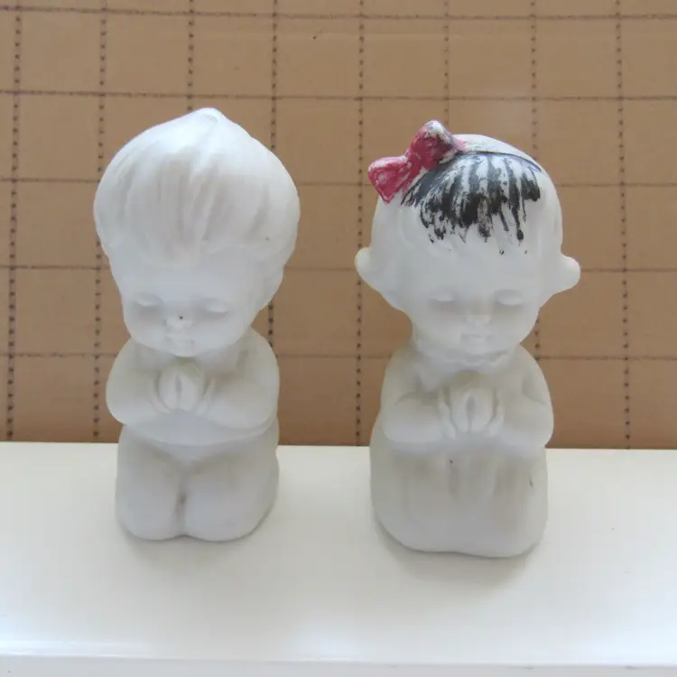 Bisque Praying Boy & Girl w/Black Hair and Bow Salt and Pepper Shaker Set