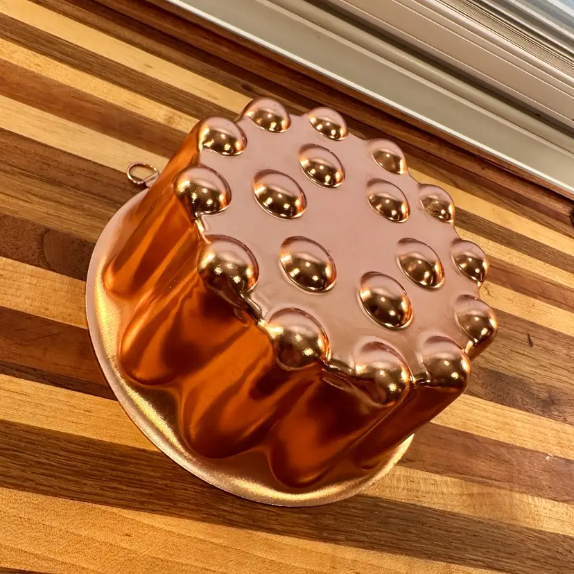Vintage copper jello mold with embossed bubbles