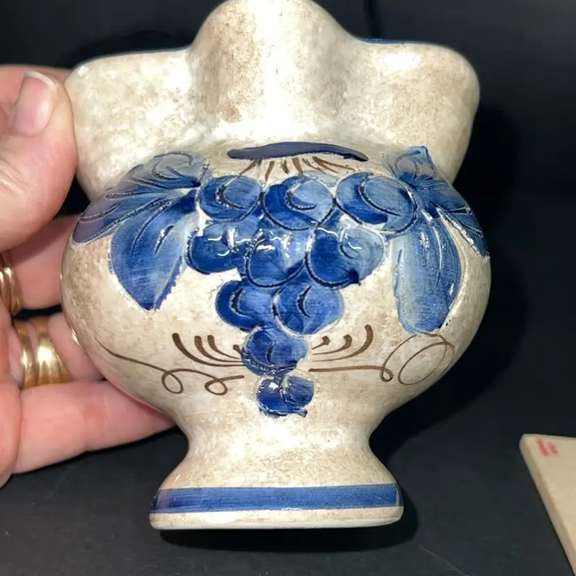 This is a handmade studio art pottery pitcher.