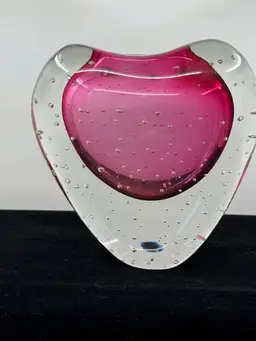 Murano Style hand-blown art glass heart-shaped vase with pink interior and control bubbles.