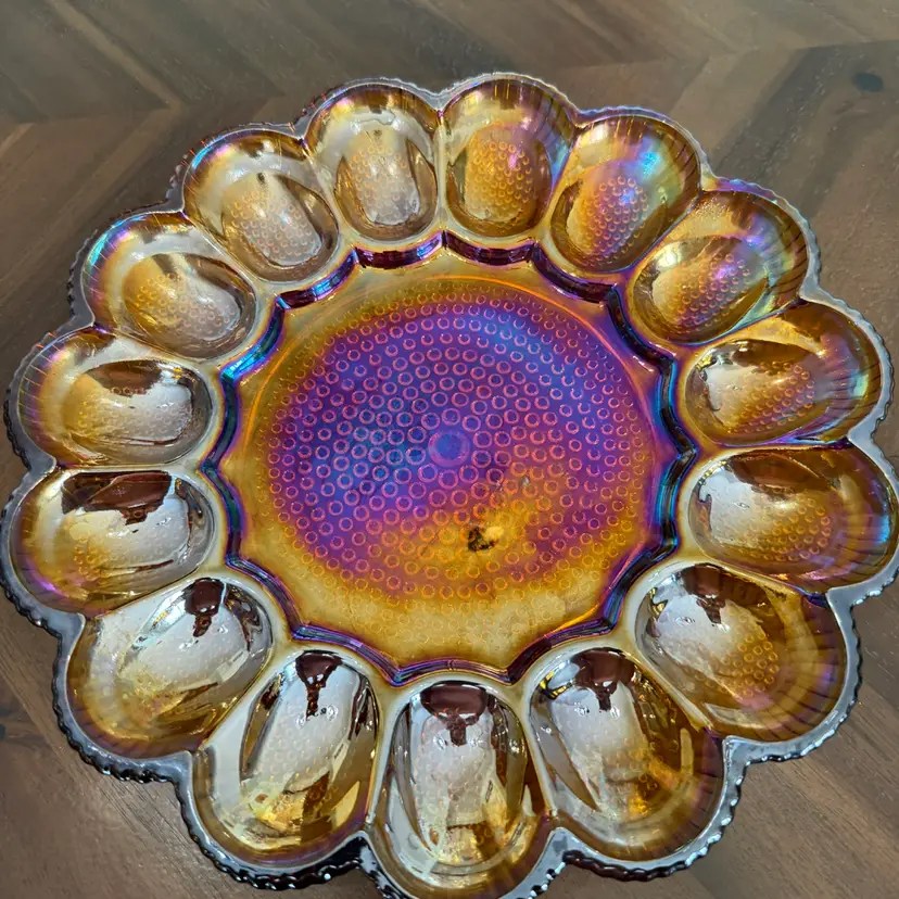 Amber iridescent carnival glass deviled egg serving plate.