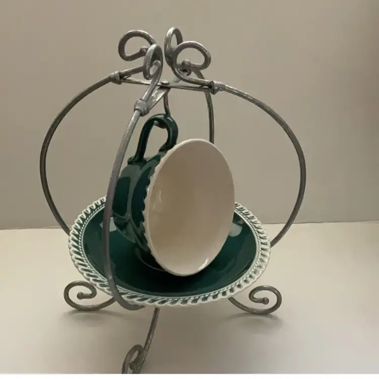 Silver Colored Teacup And Saucer Display