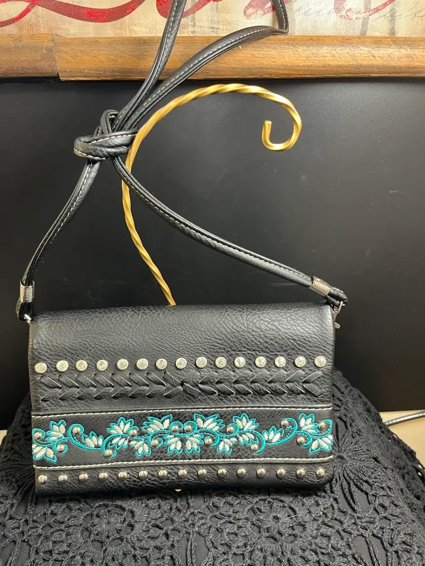 Black with Turquoise & White Thread design, Rhinestons, Basic Bling-Clutch/Crossbody. Long Strap is Removable.  Several Compartments. Silver Hardware.