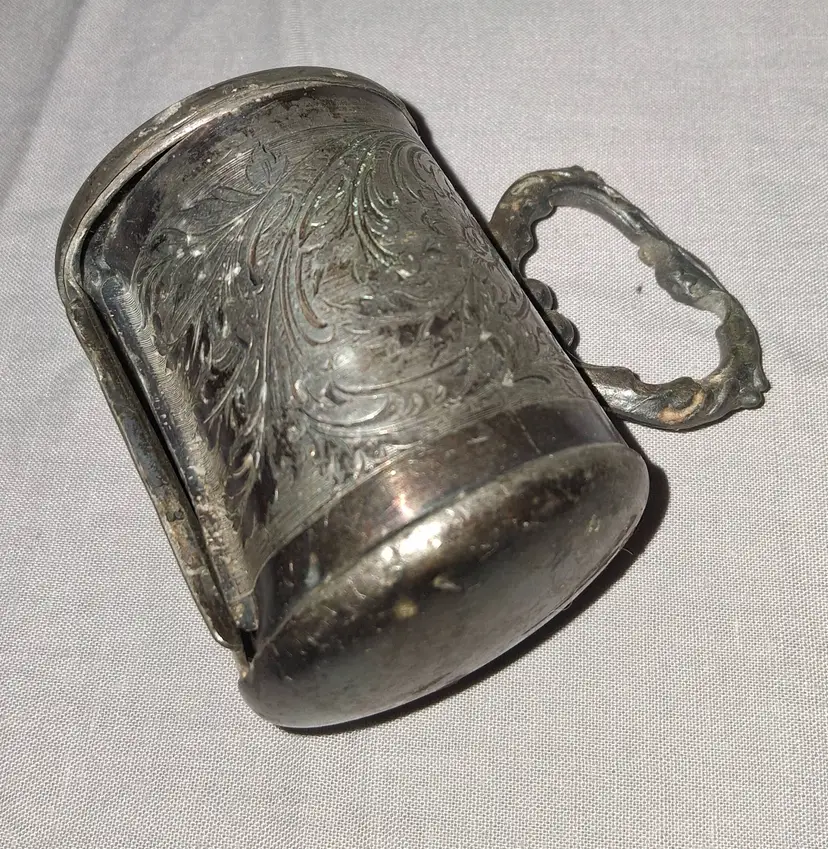 Share Vintage pewter rolled stamp dispenser with floral design and handle