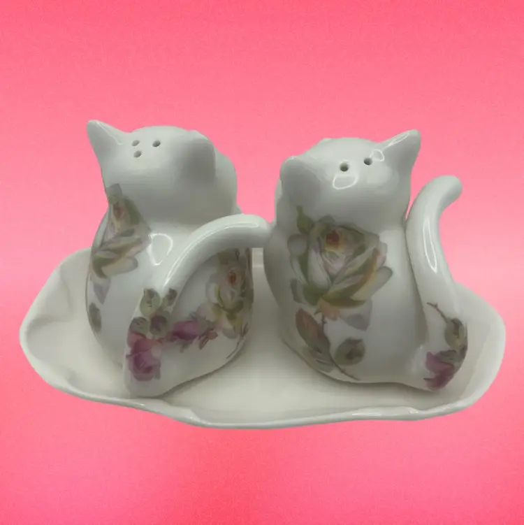 Porcelain Cat Salt And Pepper Shakers On A Tray, Each Cat Is 3” Diameter And The Tray Is 6” Wide