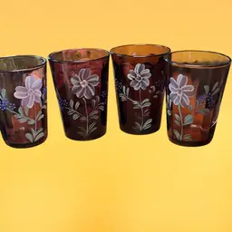 32. set of four antique Victorian amethyst art glass tumblers decorated with hand-painted florals