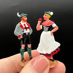 008. Pair Of Metal German Folkloric Figurines