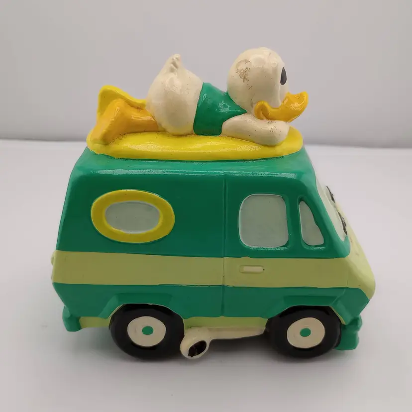 Vintage Donald Duck surfing van bank